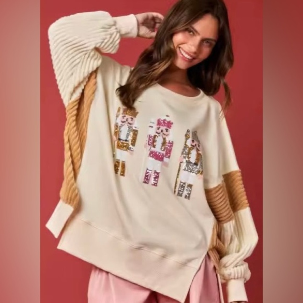 Cream and Tan Women's Sweater with Nutcracker Design
